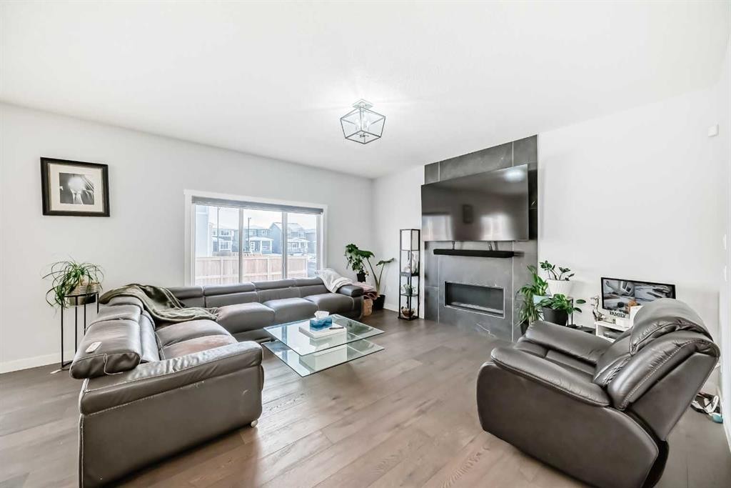 2 Chelsea Bay, Chestermere, AB - Indoor Photo Showing Living Room With Fireplace