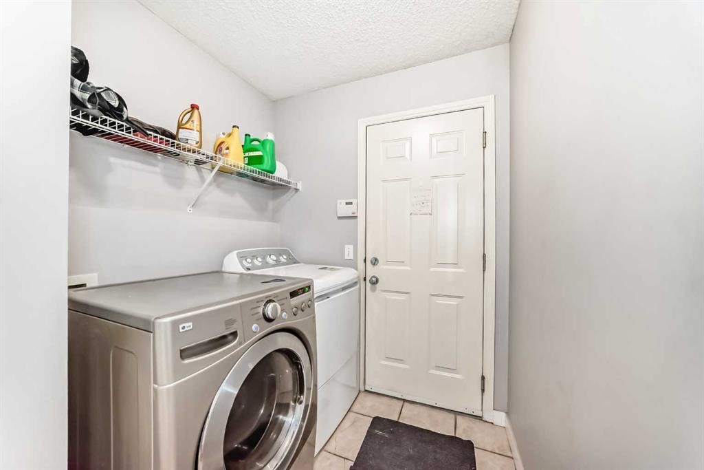 39 Saddleridge Close Ne, Calgary, AB - Indoor Photo Showing Laundry Room