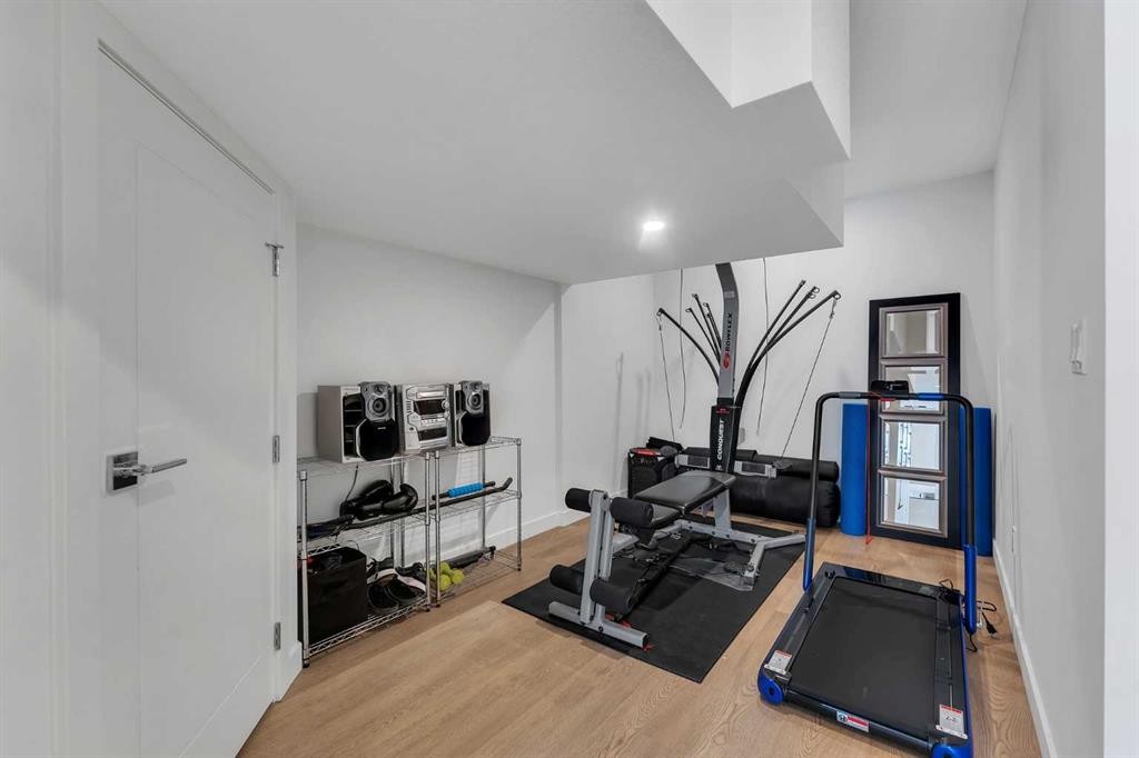 178 Dawson Way, Chestermere, AB - Indoor Photo Showing Gym Room