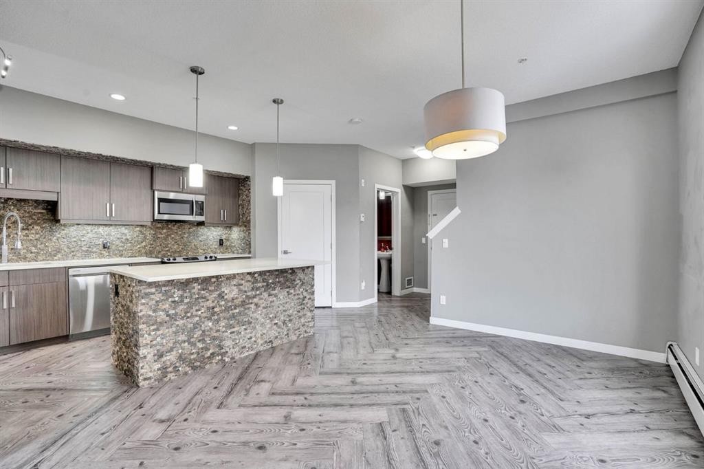 228-10 Westpark Link Sw, Calgary, AB - Indoor Photo Showing Kitchen With Upgraded Kitchen