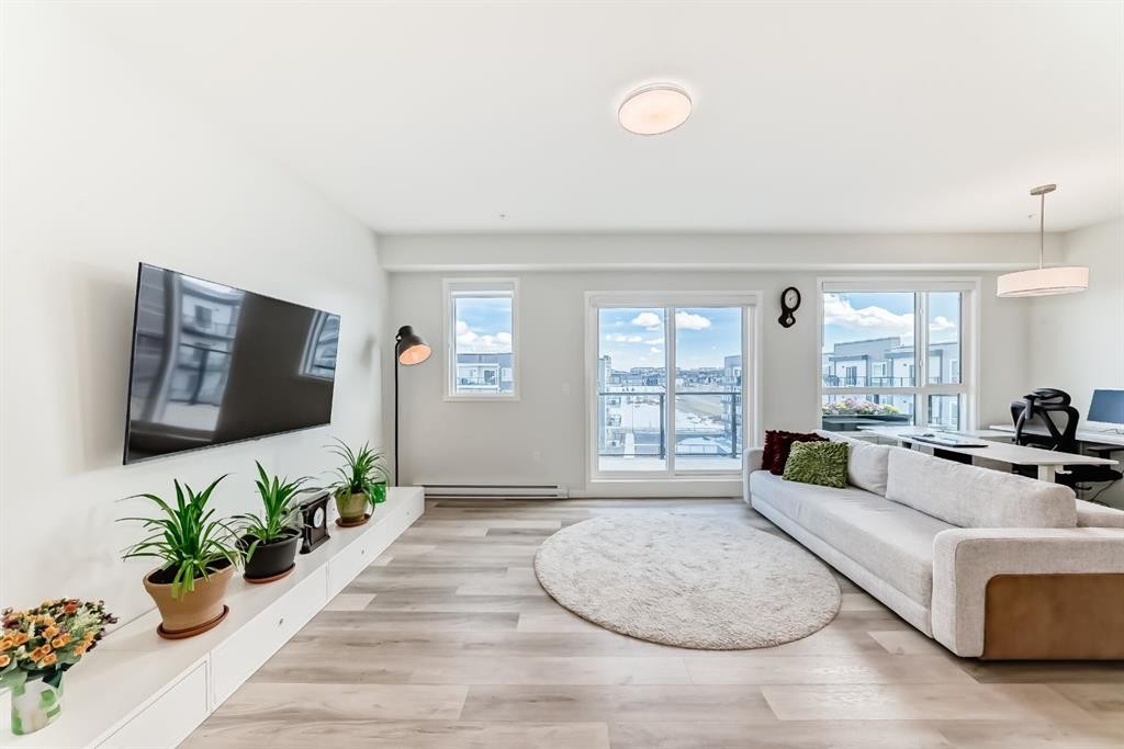 1402-33 Carringham Gate Nw, Calgary, AB - Indoor Photo Showing Living Room