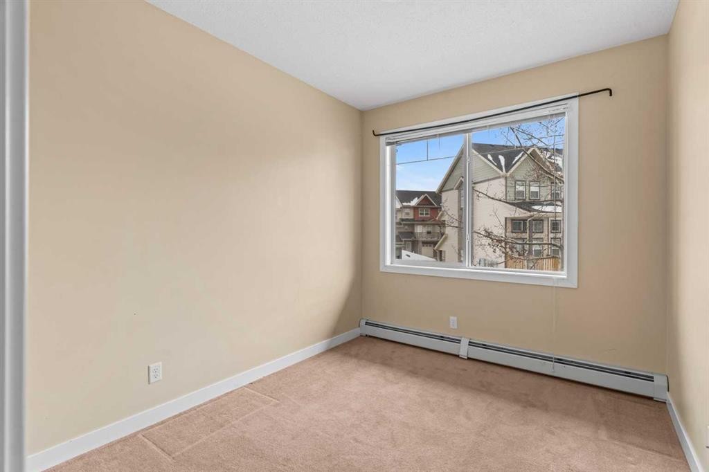 212-10 Panatella Road Nw, Calgary, AB - Indoor Photo Showing Other Room