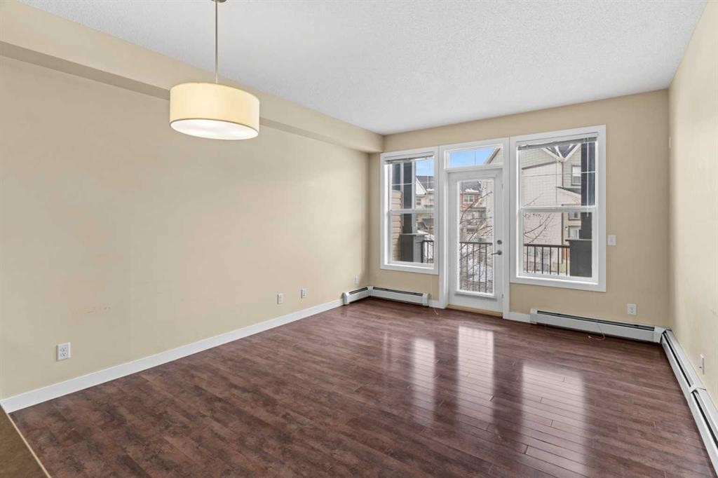212-10 Panatella Road Nw, Calgary, AB - Indoor Photo Showing Other Room