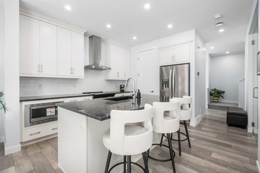 158 Magnolia Path Se, Calgary, AB - Indoor Photo Showing Kitchen With Stainless Steel Kitchen With Upgraded Kitchen