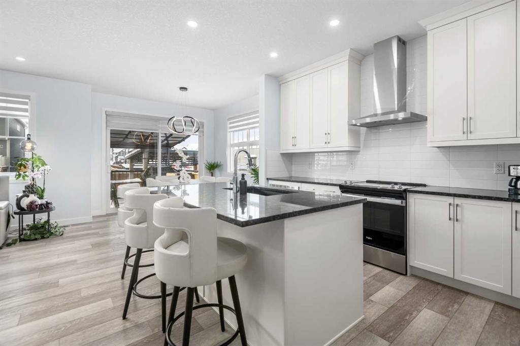 158 Magnolia Path Se, Calgary, AB - Indoor Photo Showing Kitchen With Upgraded Kitchen