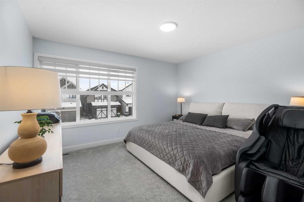 158 Magnolia Path Se, Calgary, AB - Indoor Photo Showing Bedroom