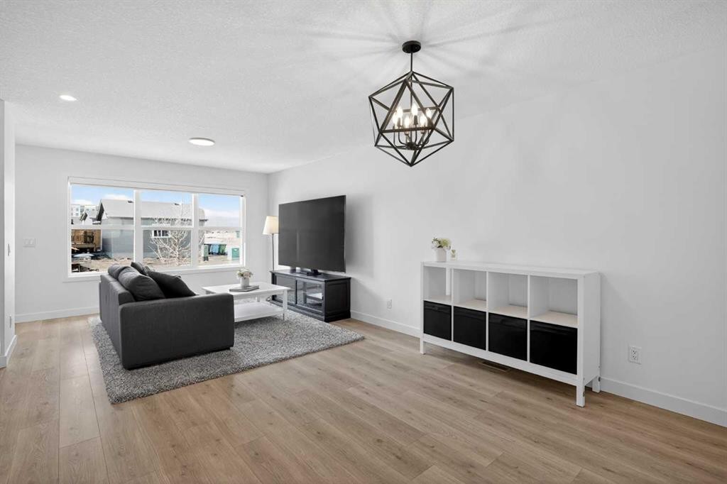 12 Heirloom Crescent Se, Calgary, AB - Indoor Photo Showing Living Room