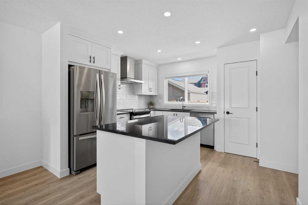 12 Heirloom Crescent Se, Calgary, AB - Indoor Photo Showing Kitchen With Upgraded Kitchen
