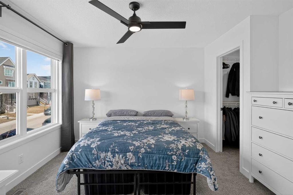 12 Heirloom Crescent Se, Calgary, AB - Indoor Photo Showing Bedroom