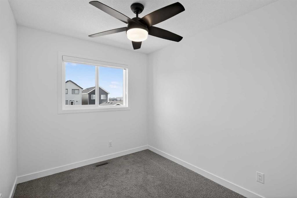 12 Heirloom Crescent Se, Calgary, AB - Indoor Photo Showing Other Room