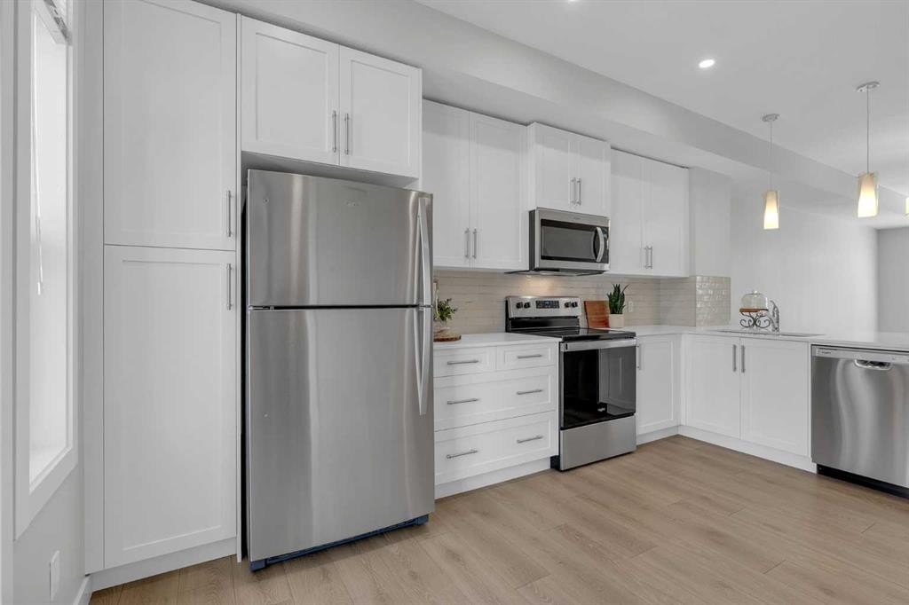 118 Legacy Path Se, Calgary, AB - Indoor Photo Showing Kitchen With Stainless Steel Kitchen With Upgraded Kitchen