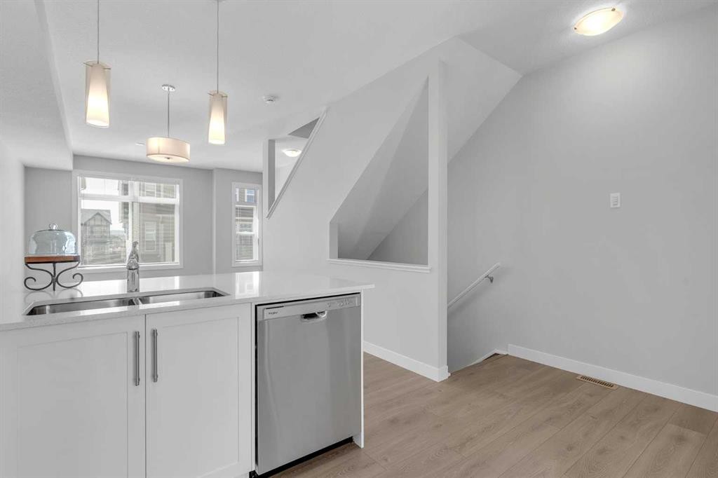 118 Legacy Path Se, Calgary, AB - Indoor Photo Showing Kitchen With Double Sink