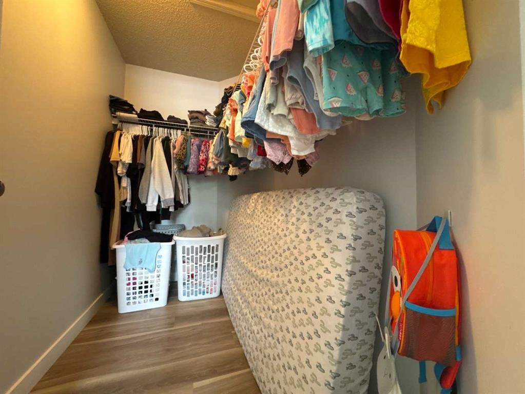 8-304 Ross Avenue, Cochrane, AB - Indoor With Storage