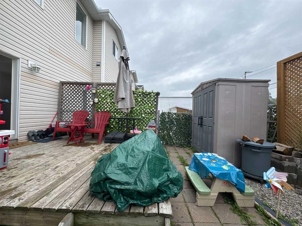 8-304 Ross Avenue, Cochrane, AB - Outdoor With Deck Patio Veranda With Exterior