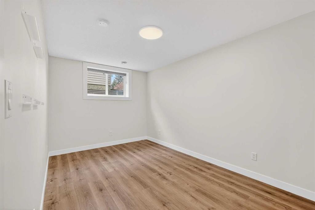 584 Woodhill Place Sw, Calgary, AB - Indoor Photo Showing Other Room