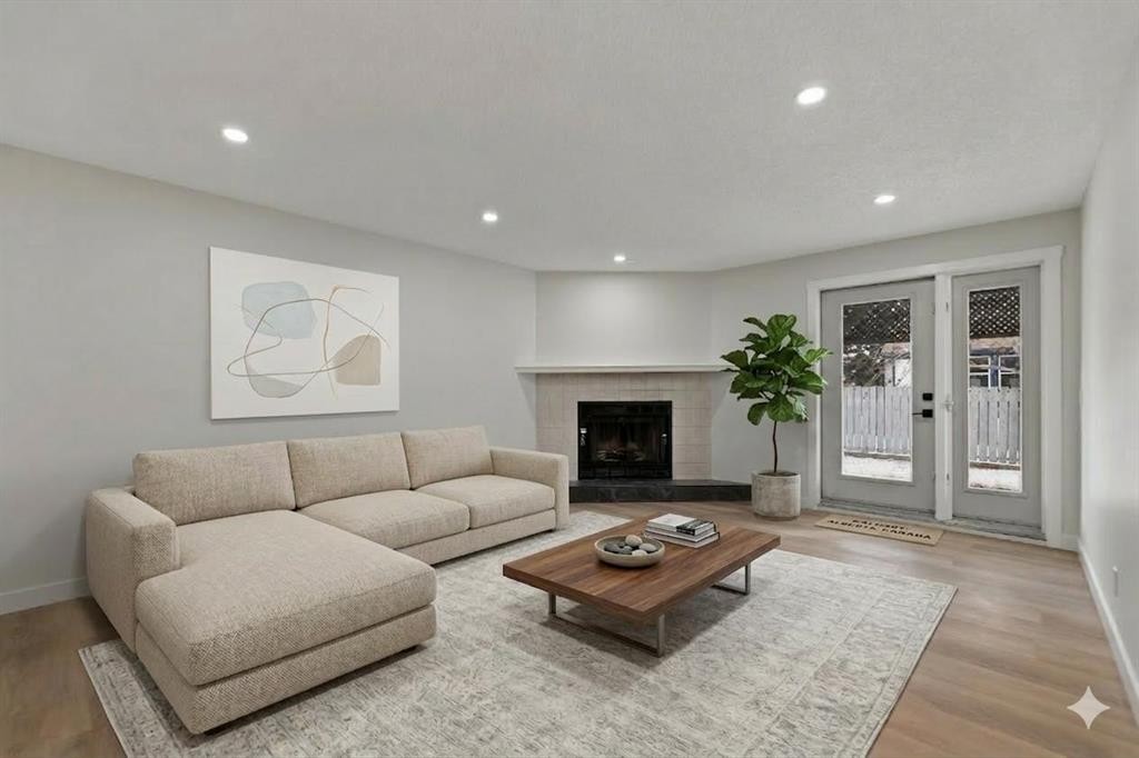 2031 24 Avenue Ne, Calgary, AB - Indoor Photo Showing Living Room With Fireplace
