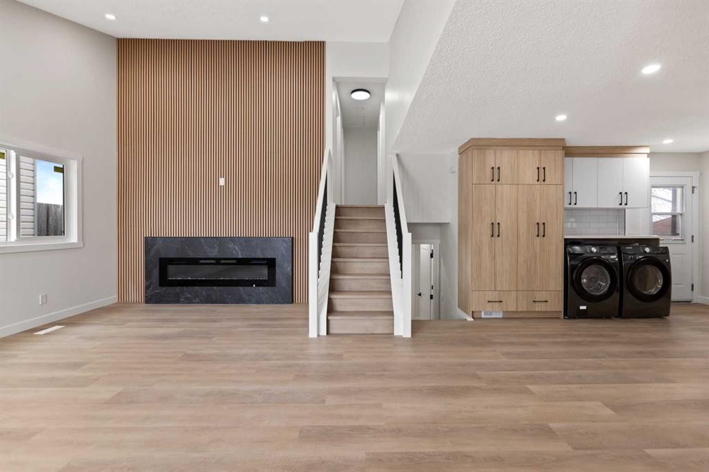2031 24 Avenue Ne, Calgary, AB - Indoor Photo Showing Other Room With Fireplace