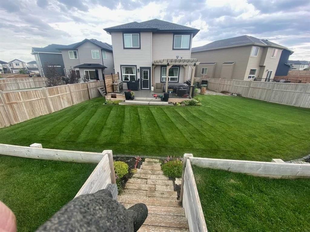 230 Nolanhurst Bay Nw, Calgary, AB - Outdoor With Deck Patio Veranda With Backyard