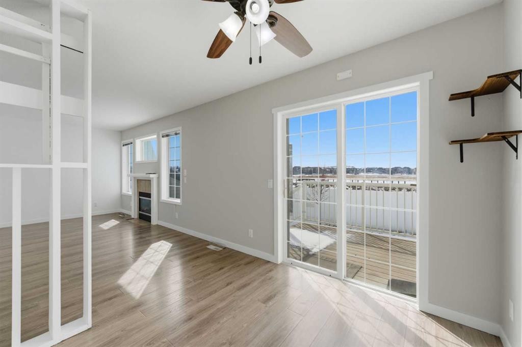 1-12 Silver Creek Boulevard Nw, Airdrie, AB - Indoor Photo Showing Other Room
