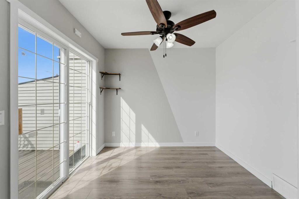 1-12 Silver Creek Boulevard Nw, Airdrie, AB - Indoor Photo Showing Other Room
