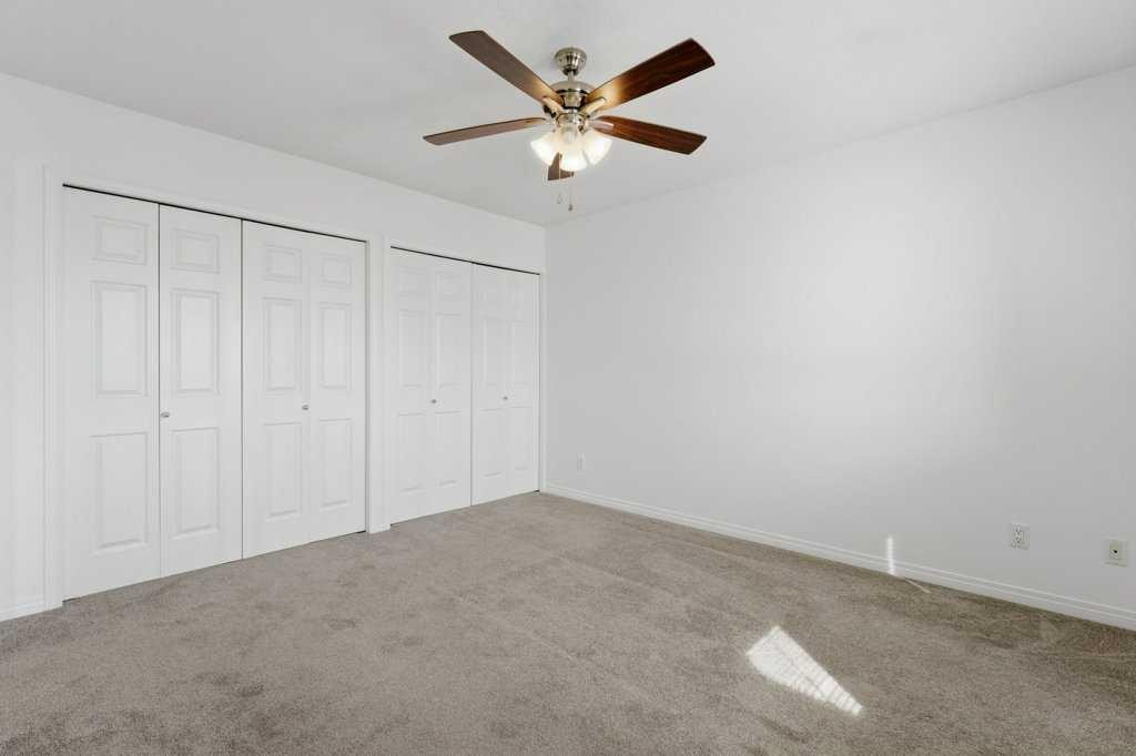 1-12 Silver Creek Boulevard Nw, Airdrie, AB - Indoor Photo Showing Other Room