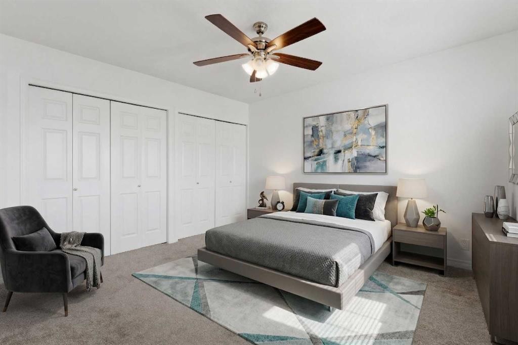 1-12 Silver Creek Boulevard Nw, Airdrie, AB - Indoor Photo Showing Bedroom