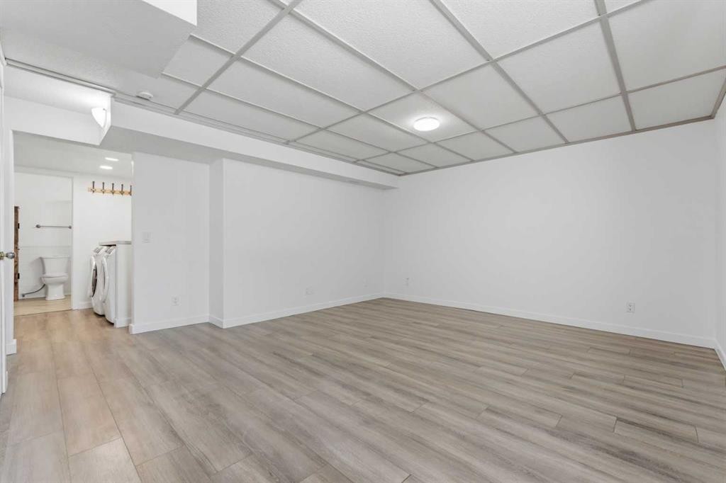 1-12 Silver Creek Boulevard Nw, Airdrie, AB - Indoor Photo Showing Other Room
