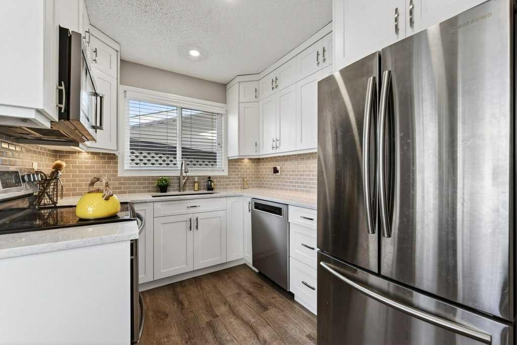 96 Templehill Drive Ne, Calgary, AB - Indoor Photo Showing Kitchen With Stainless Steel Kitchen With Upgraded Kitchen