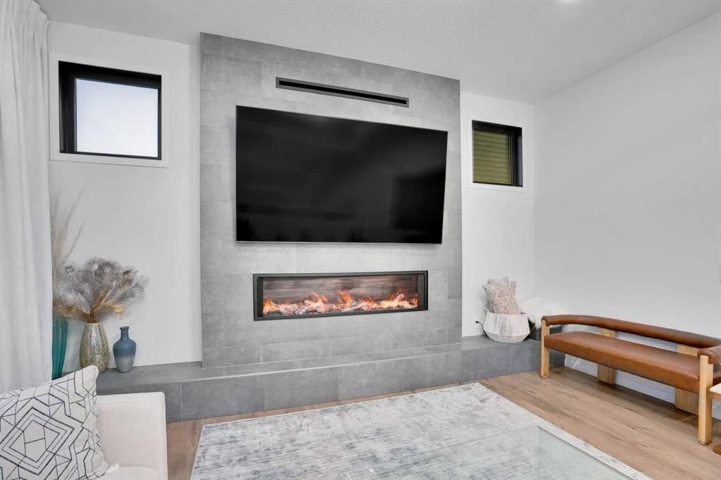 54 Calhoun Crescent Ne, Calgary, AB - Indoor Photo Showing Living Room With Fireplace