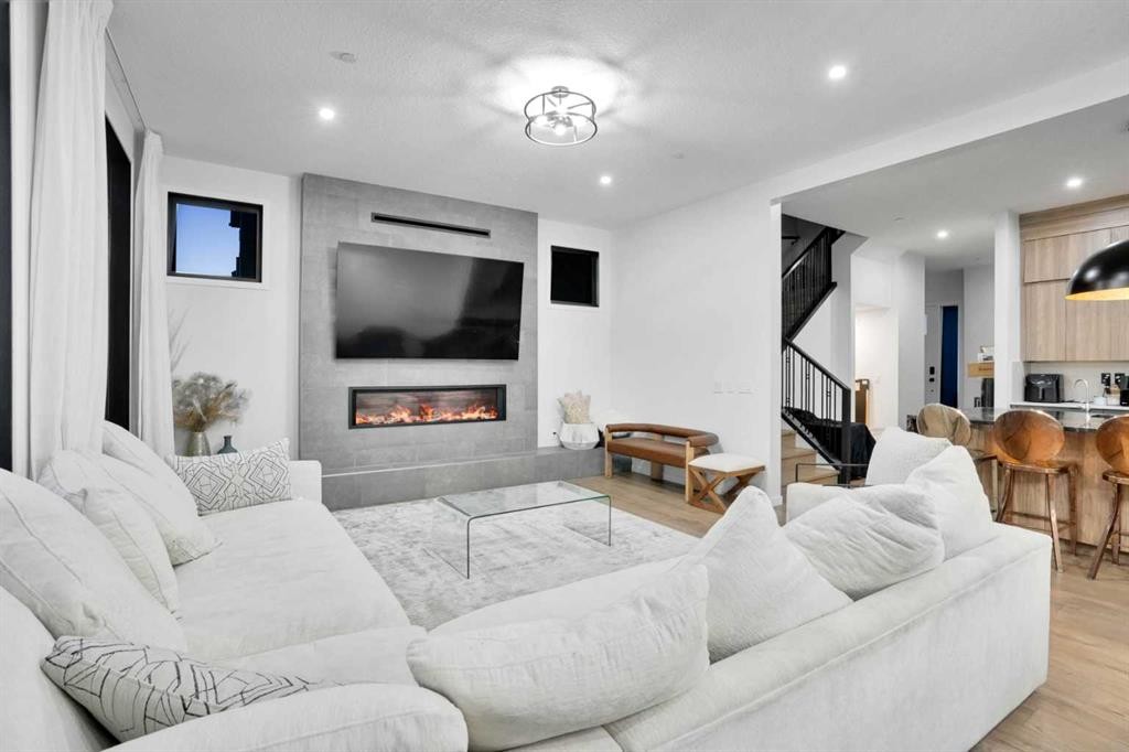 54 Calhoun Crescent Ne, Calgary, AB - Indoor Photo Showing Living Room With Fireplace