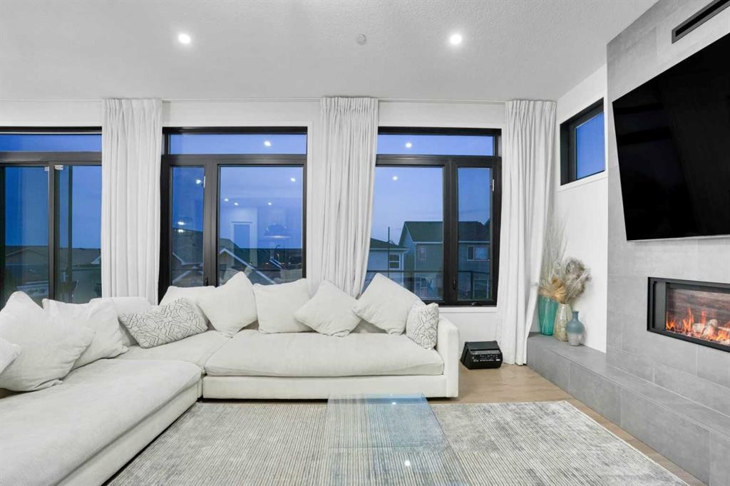 54 Calhoun Crescent Ne, Calgary, AB - Indoor Photo Showing Living Room With Fireplace