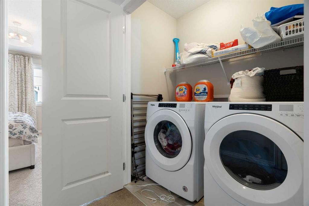 171 Chelsea Road, Chestermere, AB - Indoor Photo Showing Laundry Room