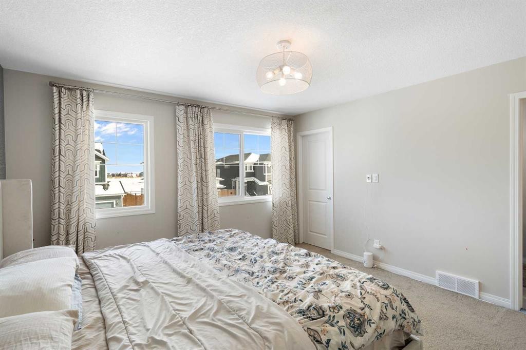 171 Chelsea Road, Chestermere, AB - Indoor Photo Showing Bedroom