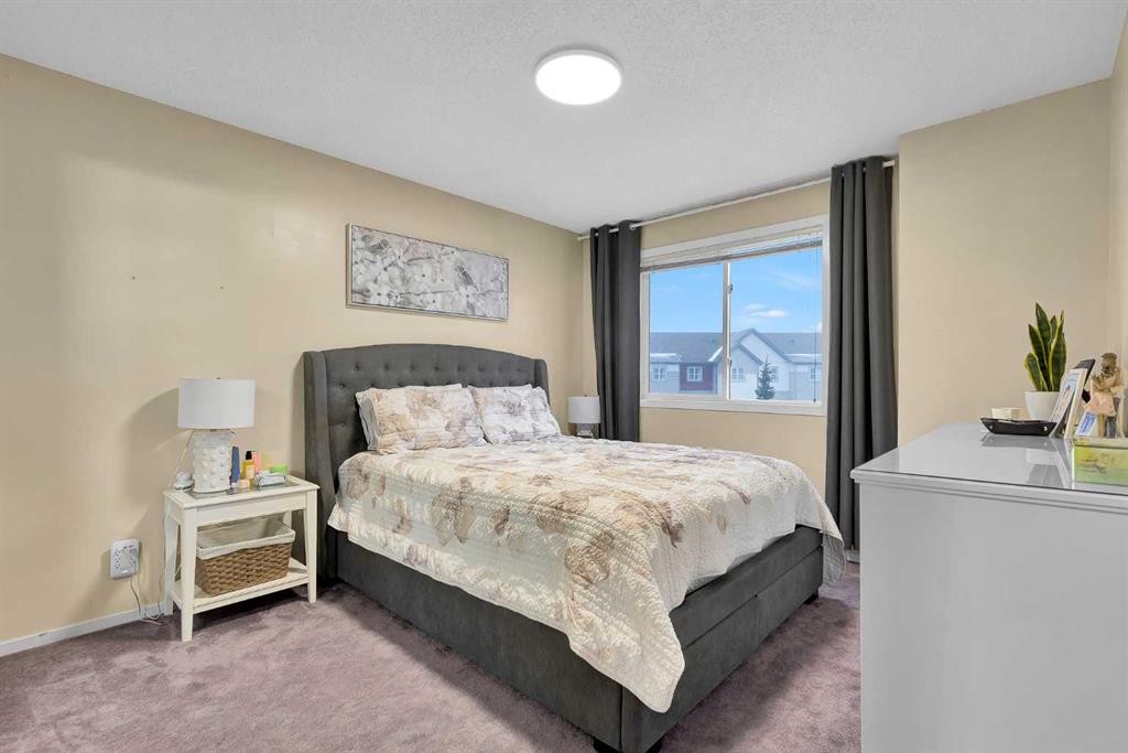 300 Copperstone Cove Se, Calgary, AB - Indoor Photo Showing Bedroom