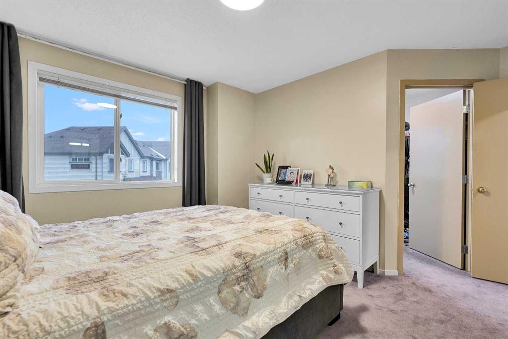 300 Copperstone Cove Se, Calgary, AB - Indoor Photo Showing Bedroom