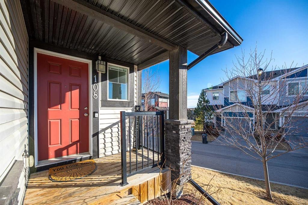 108 Jumping Pound Common, Cochrane, AB - Outdoor With Deck Patio Veranda With Exterior