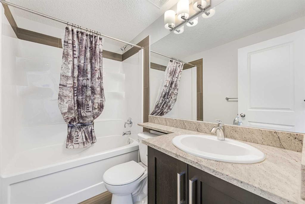 108 Jumping Pound Common, Cochrane, AB - Indoor Photo Showing Bathroom