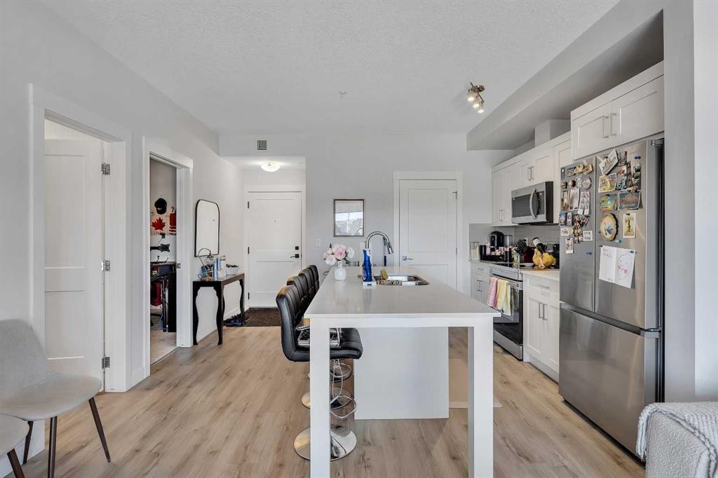 104-30 Sage Hill Walk Nw, Calgary, AB - Indoor Photo Showing Kitchen With Stainless Steel Kitchen