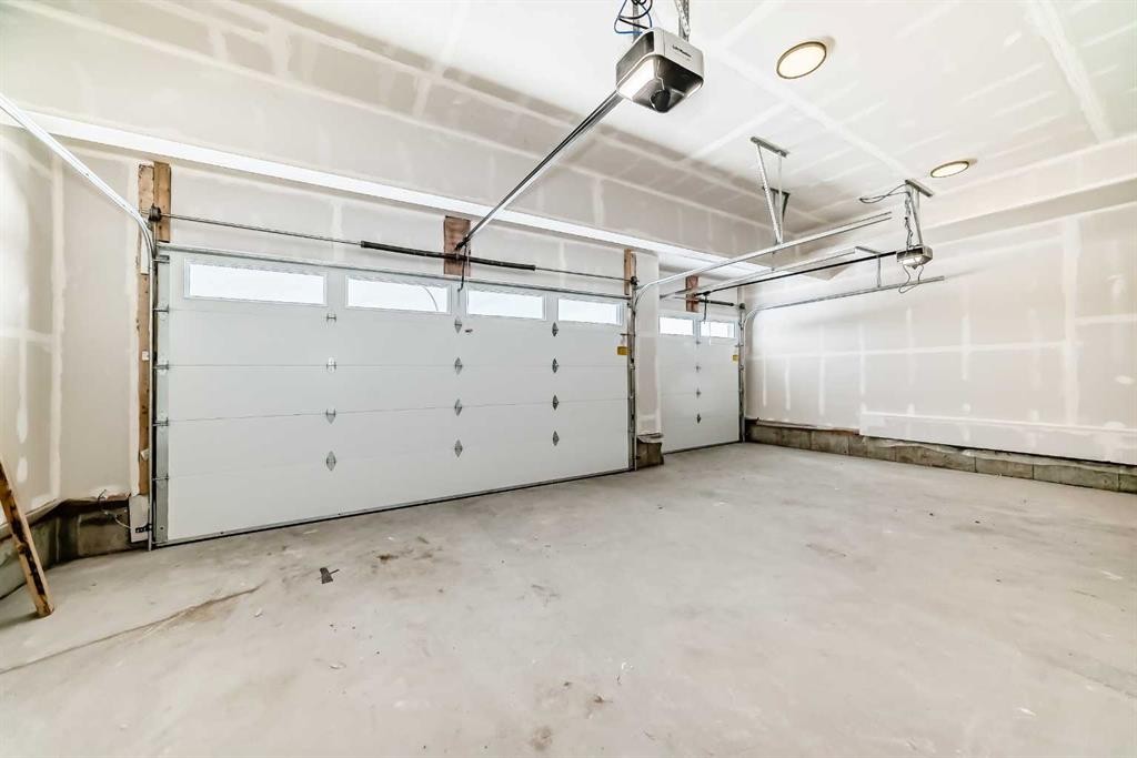 69 Lakes Estates Circle, Strathmore, AB - Indoor Photo Showing Garage
