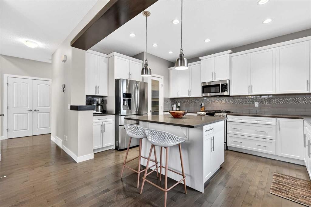 9 Legacy Lane Se, Calgary, AB - Indoor Photo Showing Kitchen With Stainless Steel Kitchen With Upgraded Kitchen