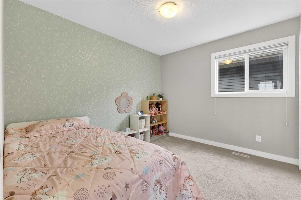 9 Legacy Lane Se, Calgary, AB - Indoor Photo Showing Bedroom