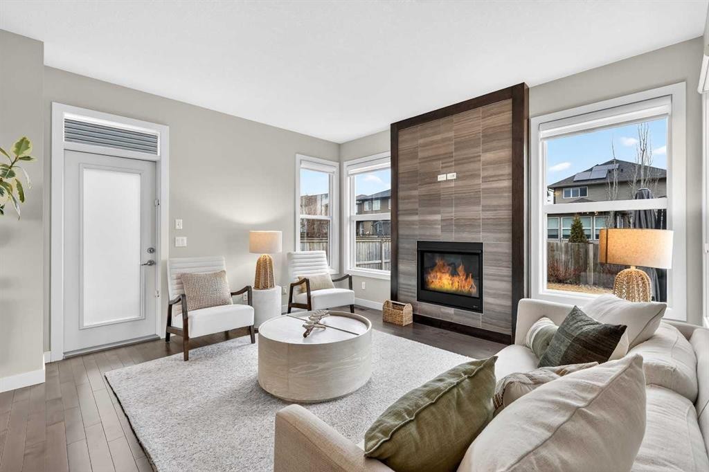 9 Legacy Lane Se, Calgary, AB - Indoor Photo Showing Living Room With Fireplace
