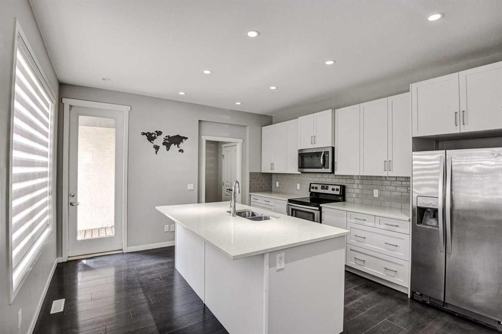 195 Masters Avenue Se, Calgary, AB - Indoor Photo Showing Kitchen With Stainless Steel Kitchen With Upgraded Kitchen