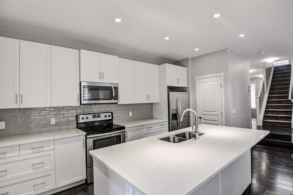 195 Masters Avenue Se, Calgary, AB - Indoor Photo Showing Kitchen With Stainless Steel Kitchen With Double Sink With Upgraded Kitchen