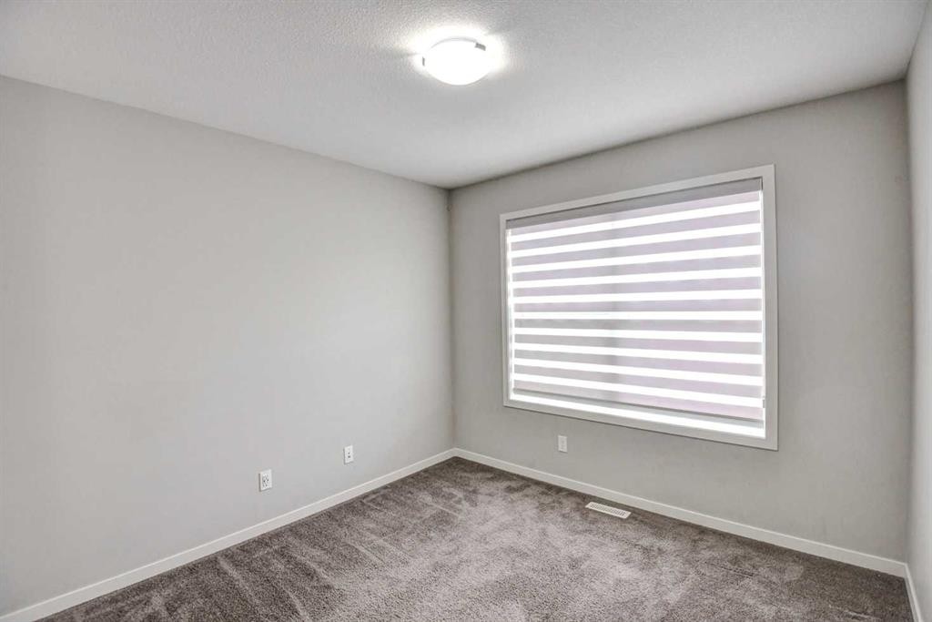 195 Masters Avenue Se, Calgary, AB - Indoor Photo Showing Other Room