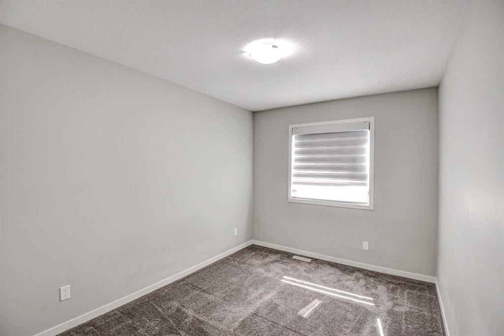195 Masters Avenue Se, Calgary, AB - Indoor Photo Showing Other Room