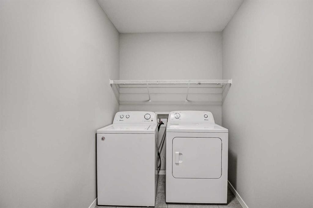 195 Masters Avenue Se, Calgary, AB - Indoor Photo Showing Laundry Room