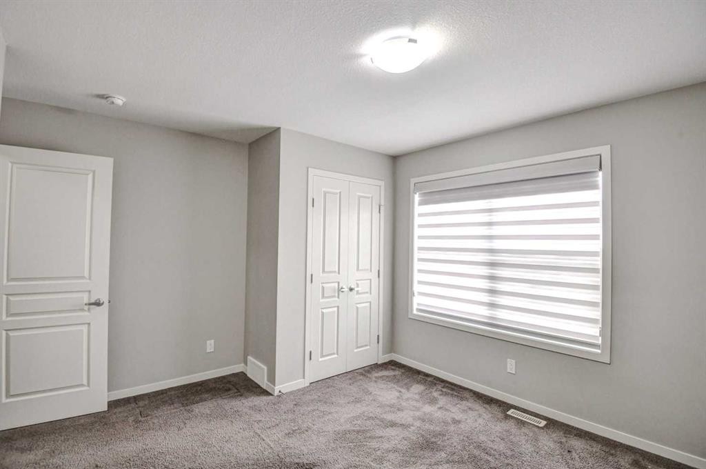 195 Masters Avenue Se, Calgary, AB - Indoor Photo Showing Other Room