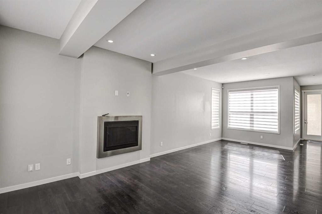 195 Masters Avenue Se, Calgary, AB - Indoor With Fireplace