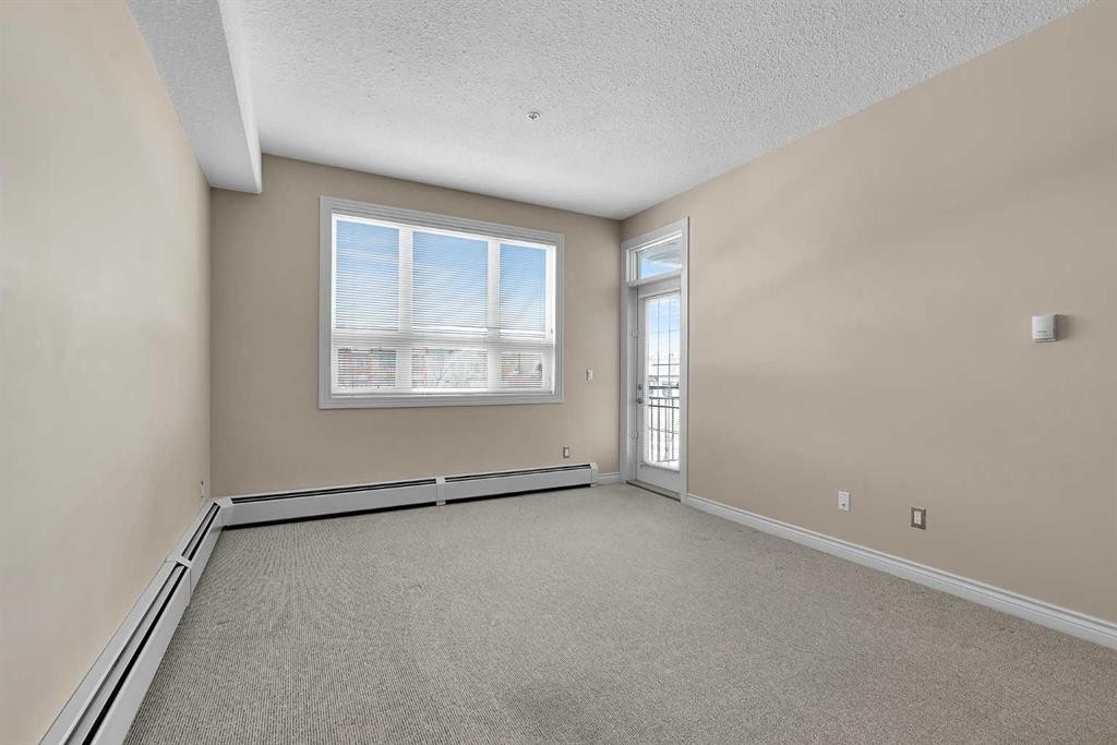 318-26 Val Gardena View Sw, Calgary, AB - Indoor Photo Showing Other Room